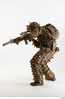 Frankie Perry in Ghillie Shooting crouching shooting standing whole body…